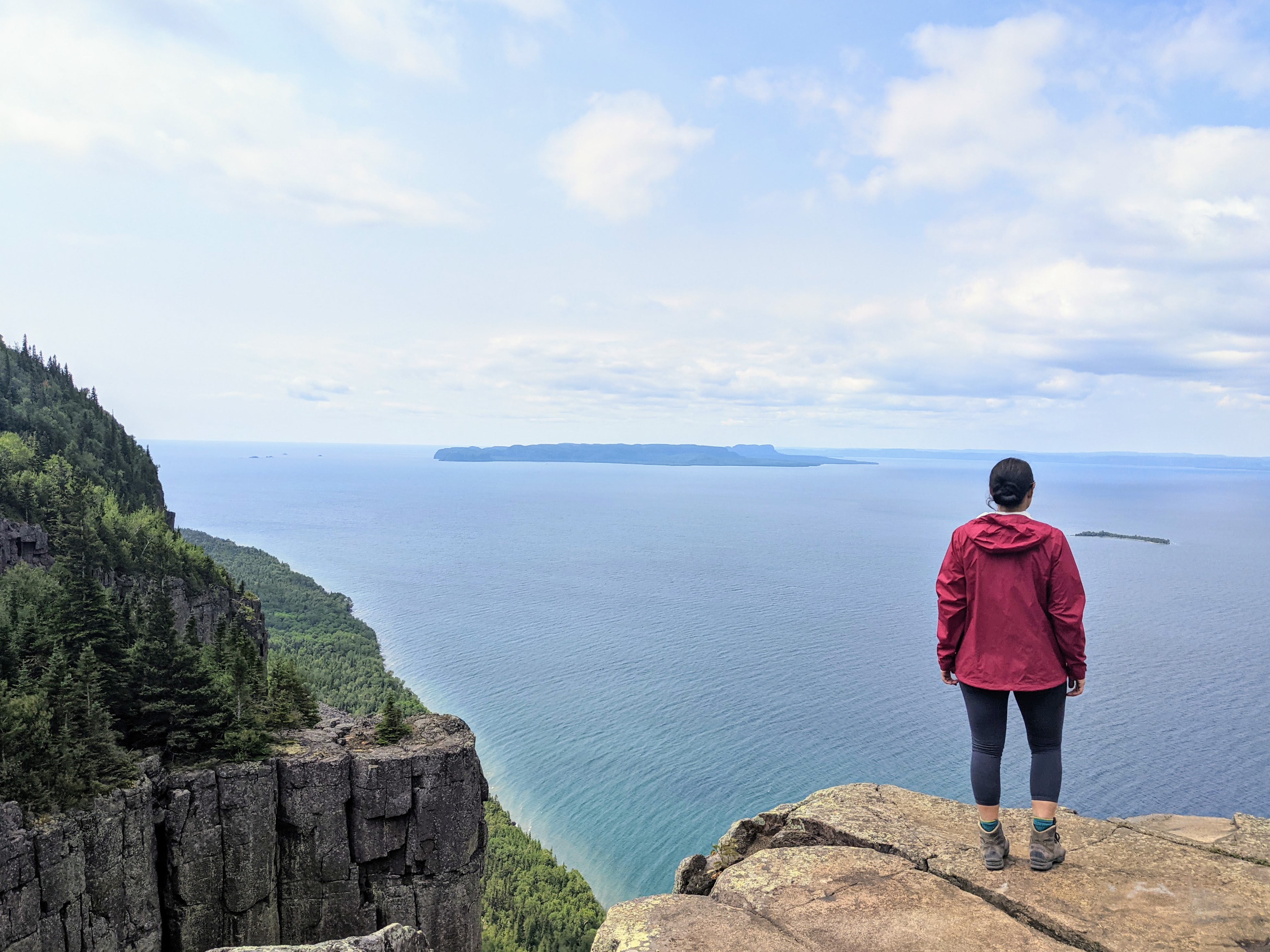 hiker on top of the giant in sleeping giant provincial park, one of the best hikes in Ontario