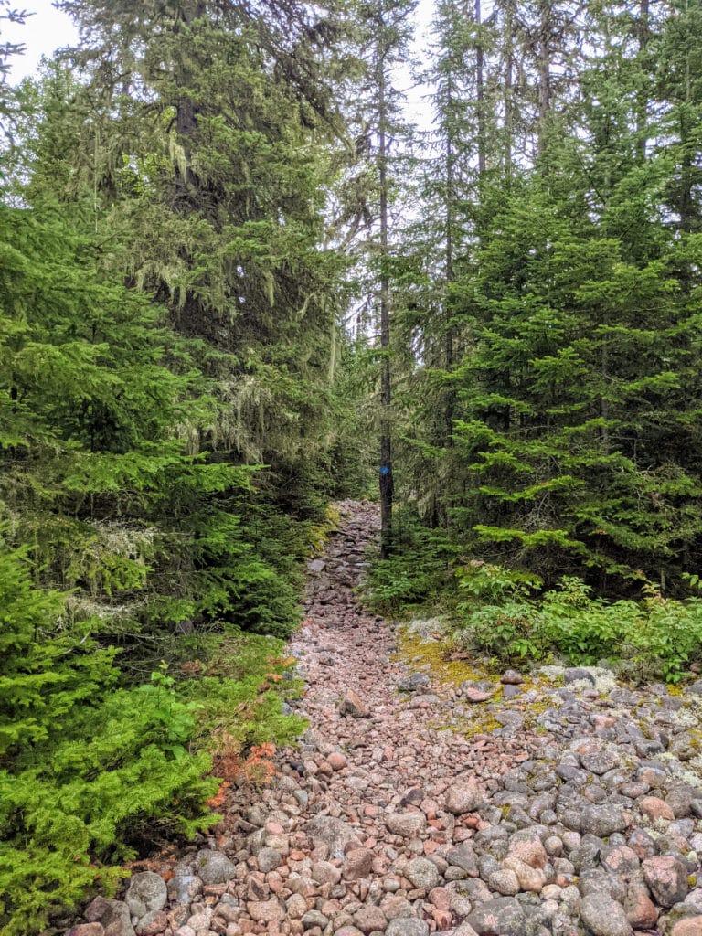 the rocky trailhead of Nokomis trail in Lake Superior Provincial Park
