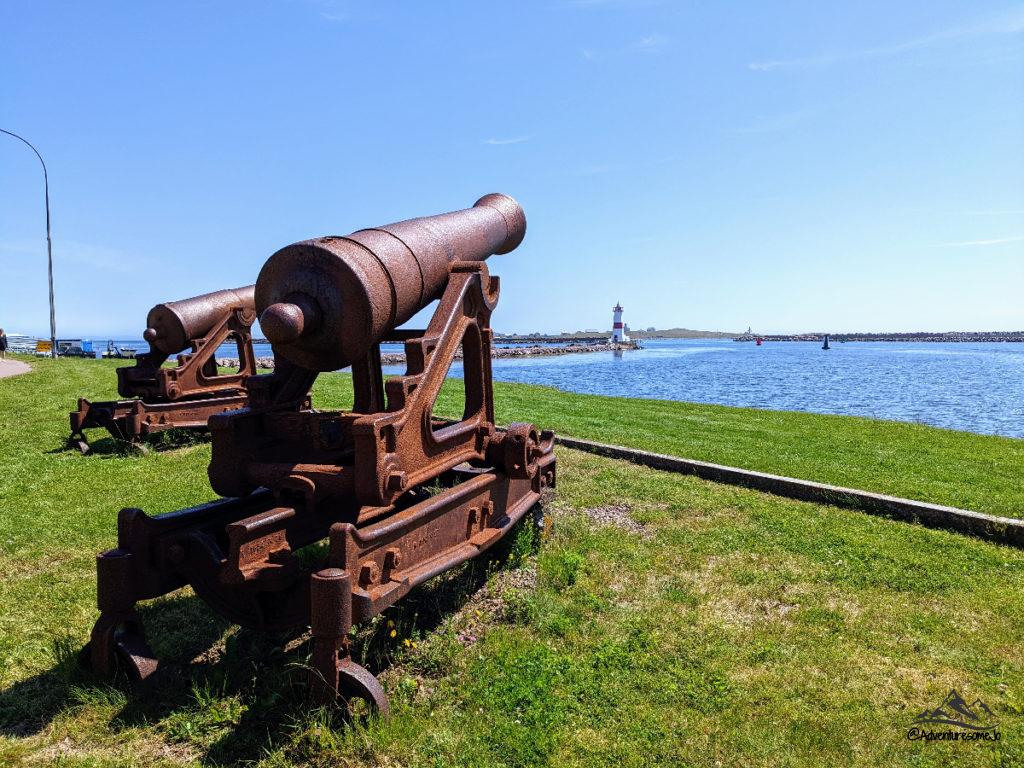 canons with the Pointe-aux-Canons lighthouse in the distance in Saint-Pierre.