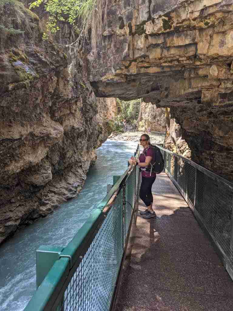 walking on the walkway by the river at the bottom of Johnston Canyon in the Canadian Rockies