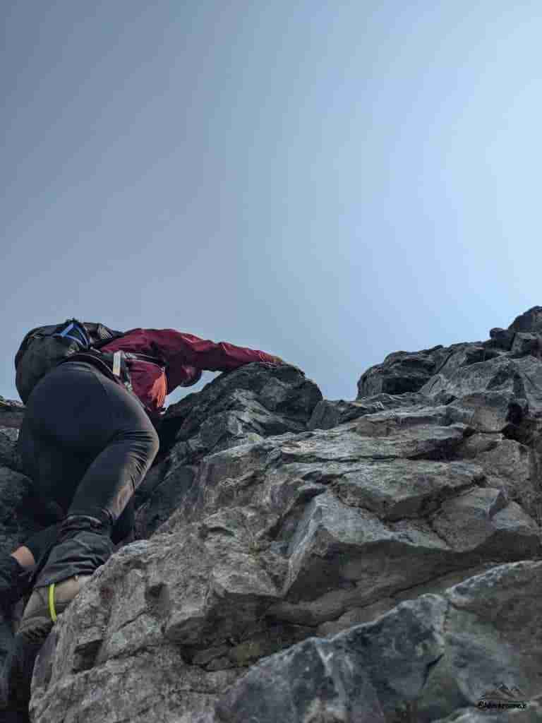 crux of the route climbing a five-meter rock band on Mount Temple