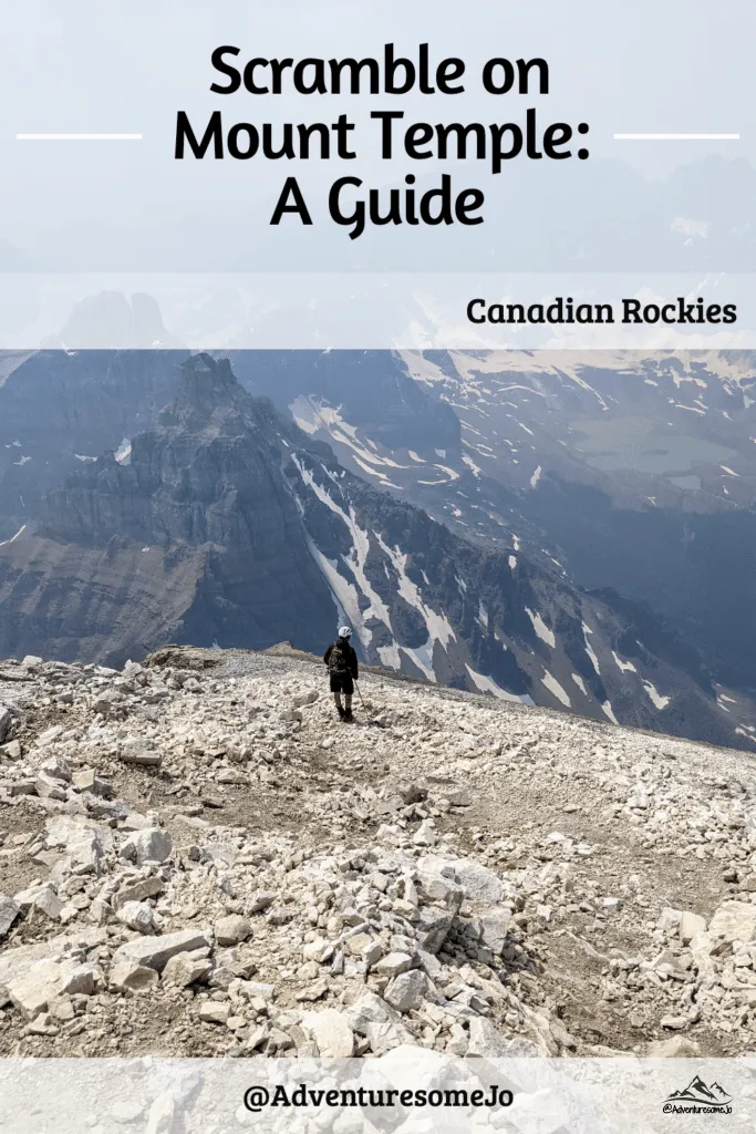 hiker on the rocky trail of Mount Temple