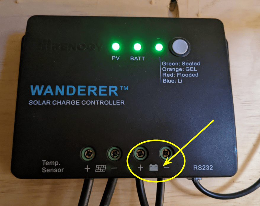 wanderer charge controller with the battery cable slots circled