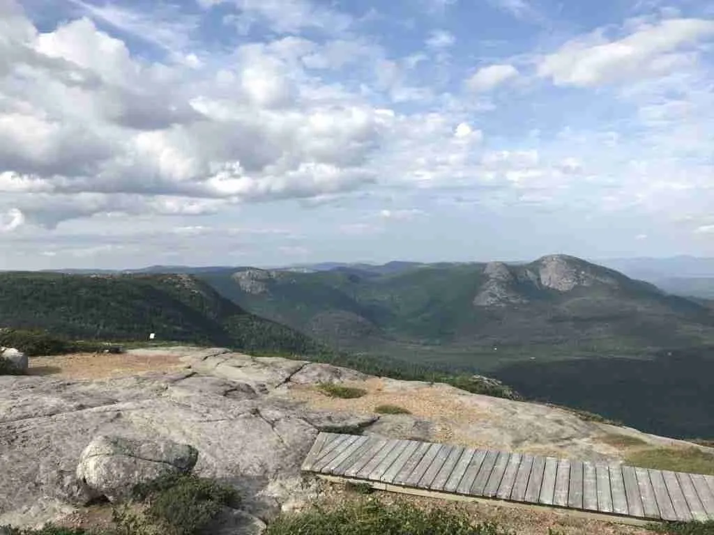 boardwalk on the summit of mont du lac des Cygnes with the view of the mountains