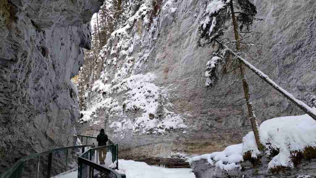 walking in Johnston Canyon in winter in Banff