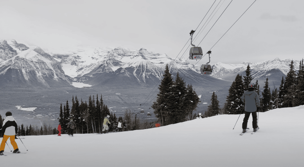 The gondolas and skiers at the Lake Louise Ski Resort