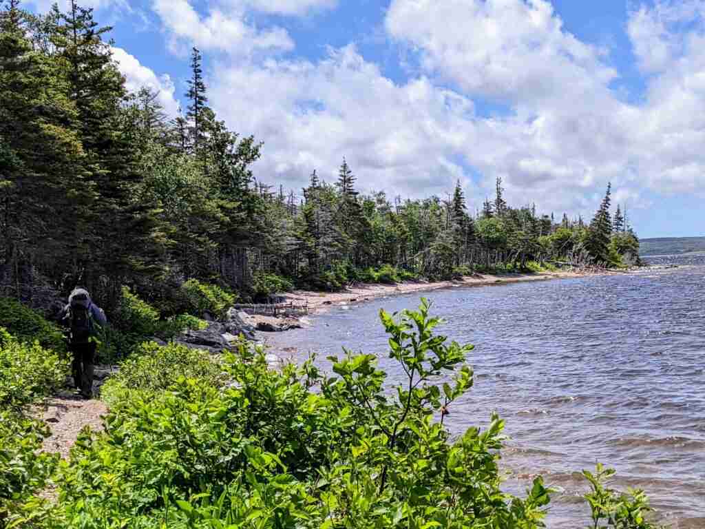The trail follows the shore of Western Brook Pond in Gros Morne National Park