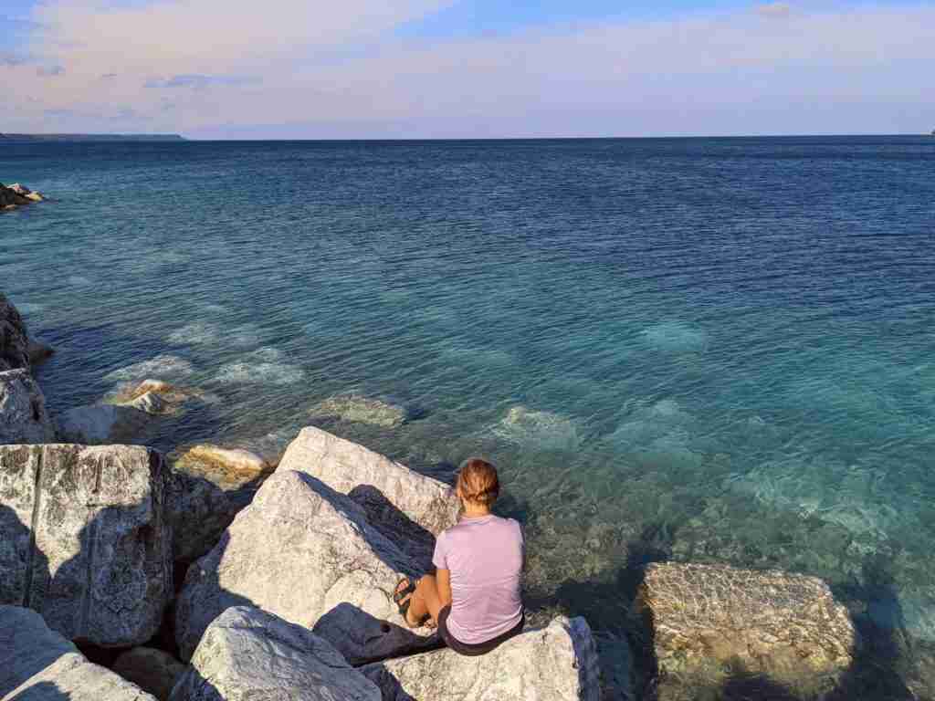 Sitting on the Breakwater near Lion's Head marina