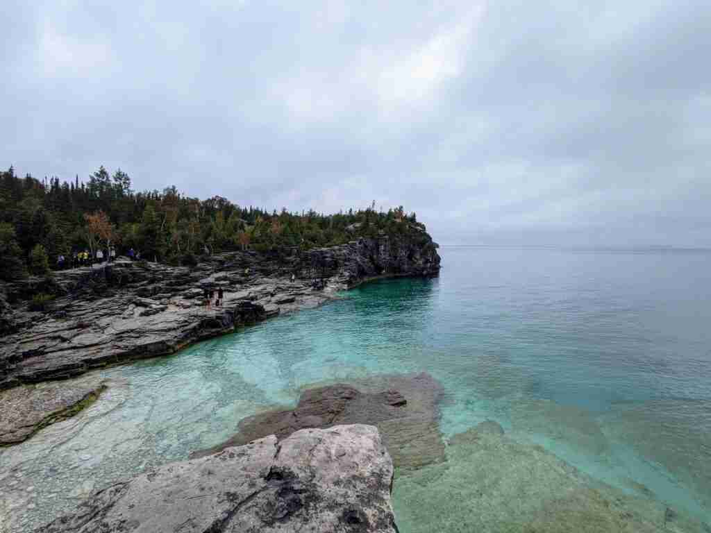 The rocky shore and the clear water of Georgian Bay on the Bruce Trail in Bruce Peninsula National Park
