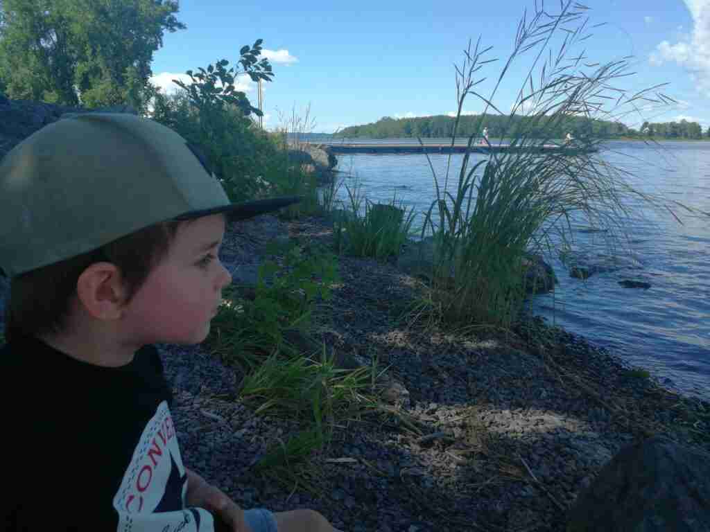 kid by a river