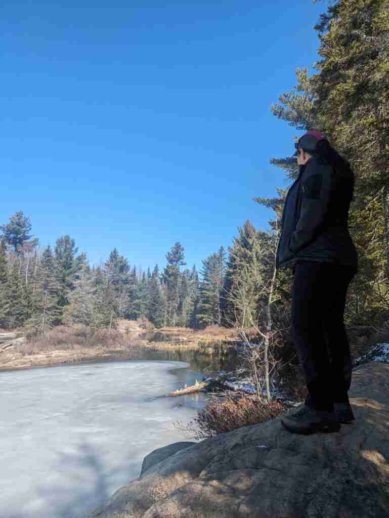 hiker admiring Pack Lake
