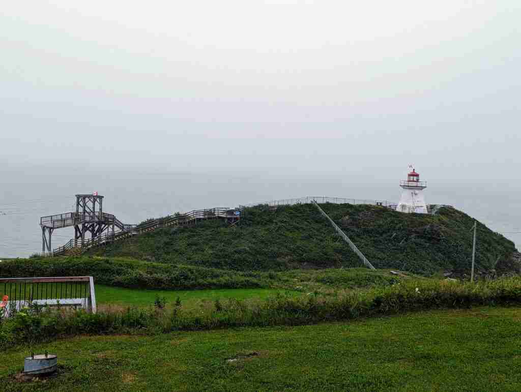 The ziplining plateform and the lighthouse of Fundy's Cape Enrage