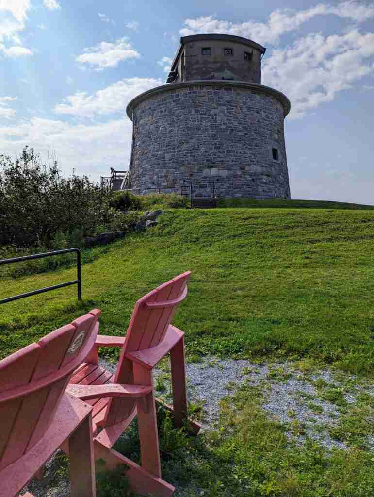 the tower and Parks Canada red chairs