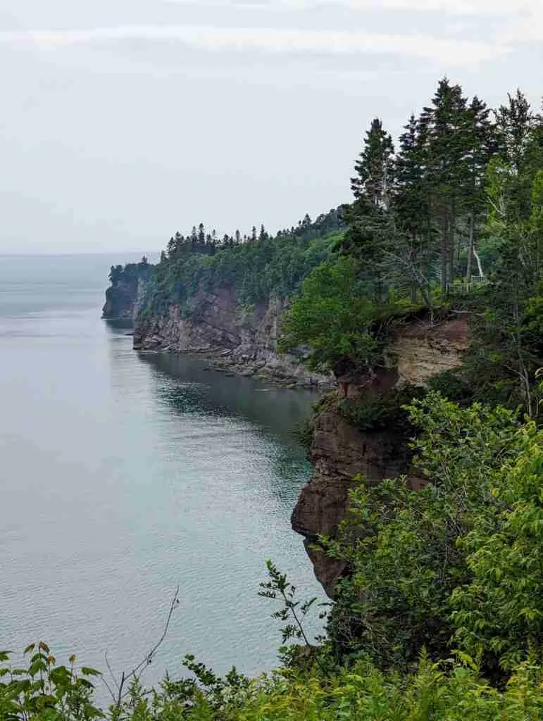 eroded tall cliffs on the shore of the bay