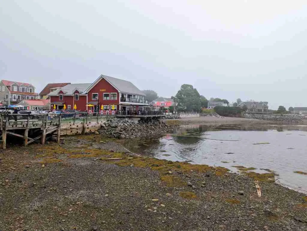 boardwalk at low tide with shops and restaurants in St Andrews New Brunswick