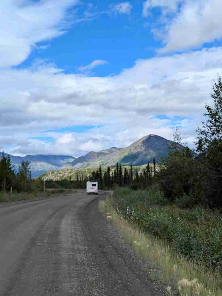 dirt road heading towart tombstone mountains