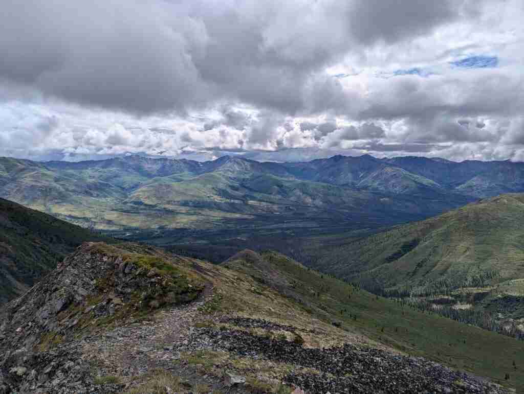 view of the mountains and valleys when backpacking the Grizzly Lake Trail in Tombstone Territorial Park