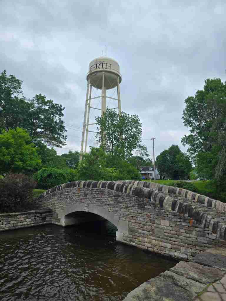 stone bridge of Stewart Park with the Perth tower behind it